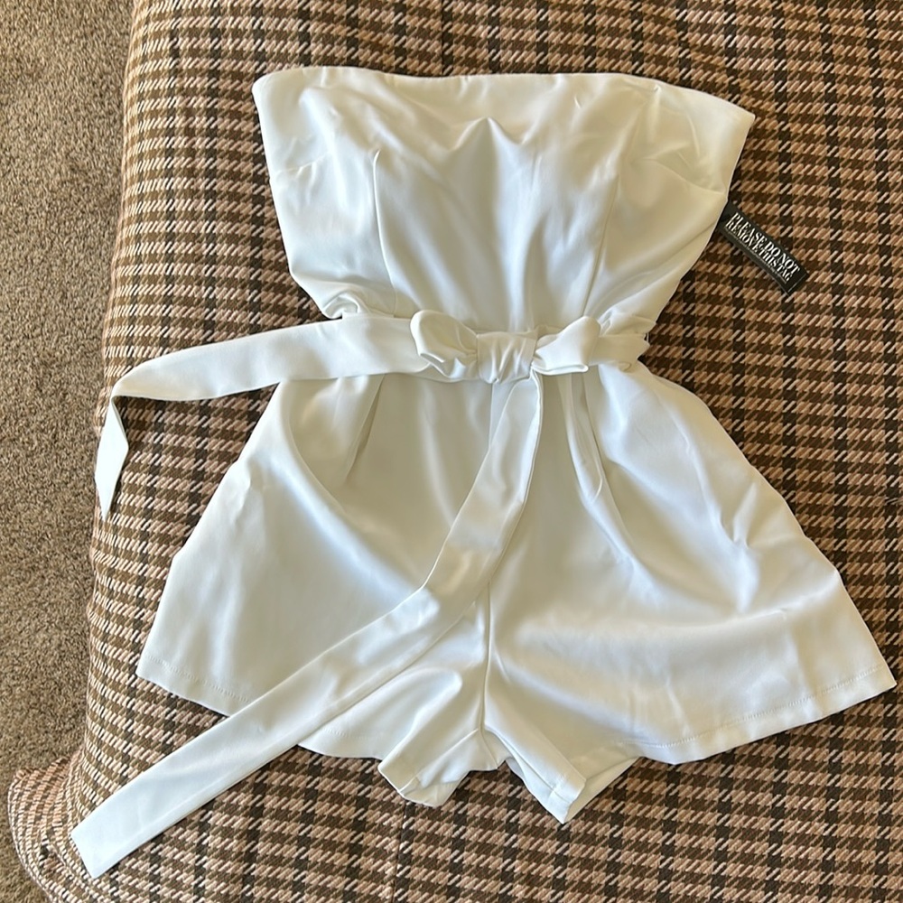 White strapless romper with waist tie. New with tags- never worn.